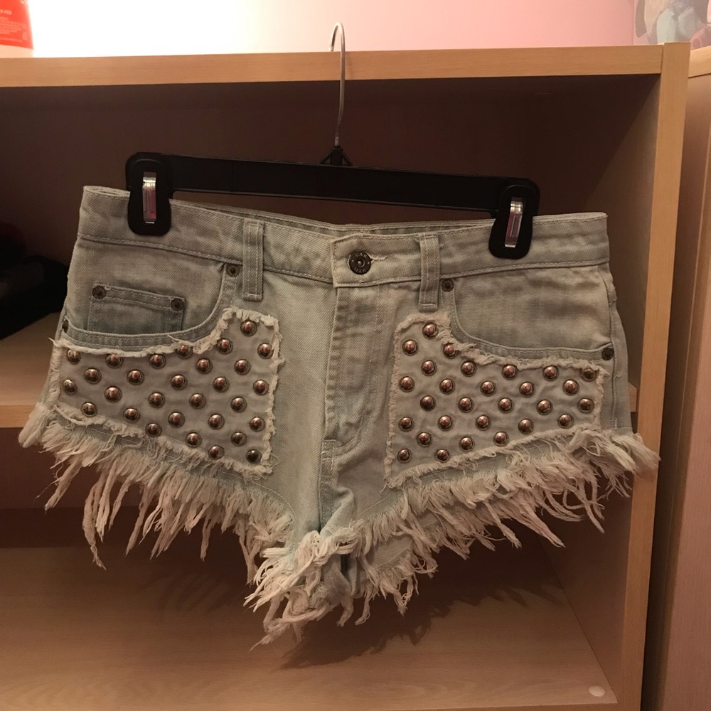High wasted light wash studded shorts